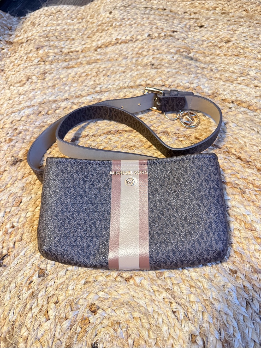 Michael Kors Navy Crossbody Wristlet with two tone tan Stripe Detail